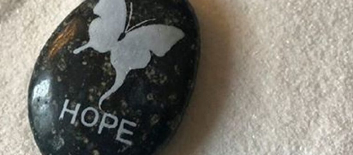 Hope Recovery Logo on stone